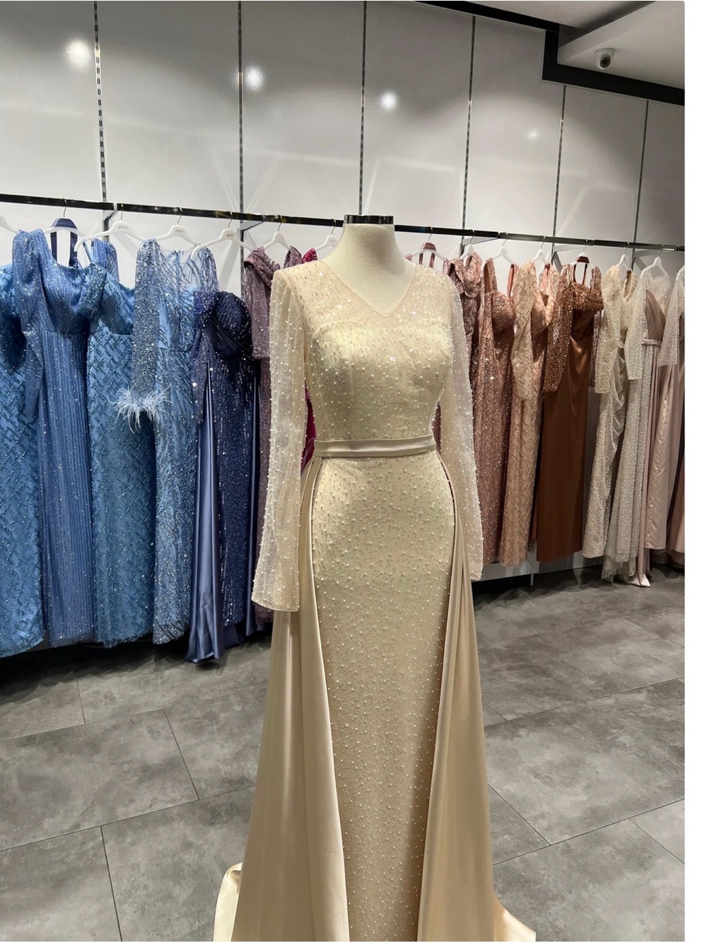 Elegant Cream Beaded Evening Gown with Sheer Long Sleeves